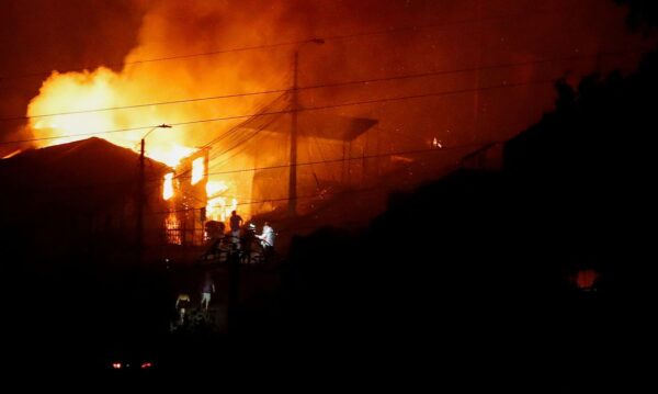 A house burns following the spread of wildfires in Vina del Mar, Chile February 3, 2024. REUTERS/Rodrigo Garrido