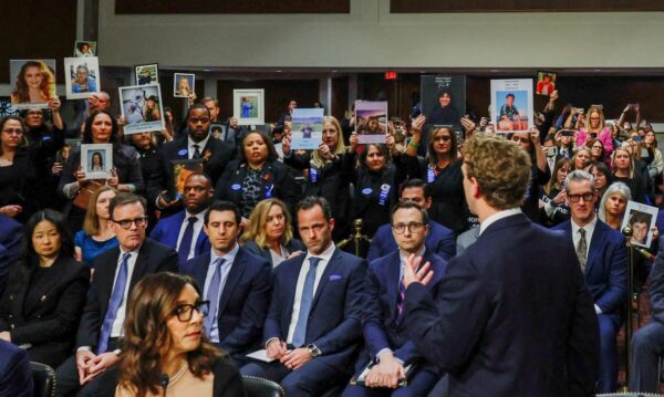 Meta's CEO Mark Zuckerberg stands and faces the audience as he testifies during the Senate Judiciary Committee hearing on online child sexual exploitation at the U.S. Capitol in Washington, U.S., January 31, 2024. REUTERS/Evelyn Hockstein TPX IMAGES OF THE DAY
