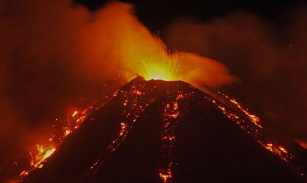 An eruption from Mount Etna lights up the sky during the night, seen from the small village of Fornazzo, under the volcano, Italy, January 18, 2021. Picture taken January 18, 2021. REUTERS/Antonio Parrinello
